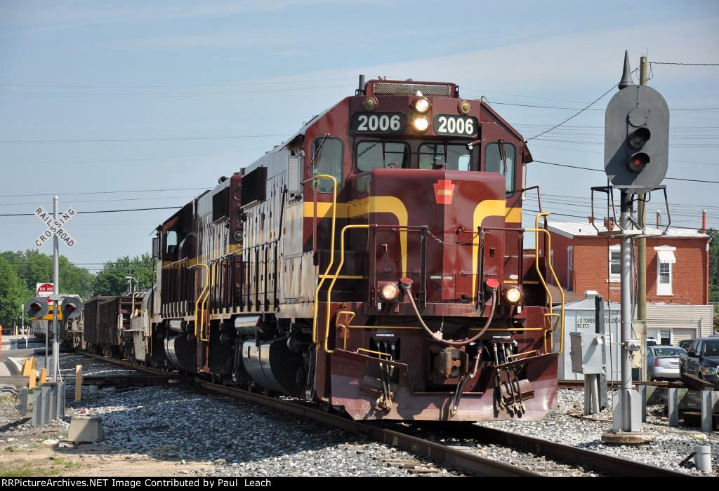 Southbound local clumps over the CSX diamond